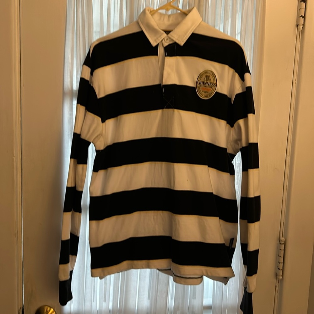 Men’s Authentic Guinness Rugby Shirt.  White with black stripes. Size: Large.
